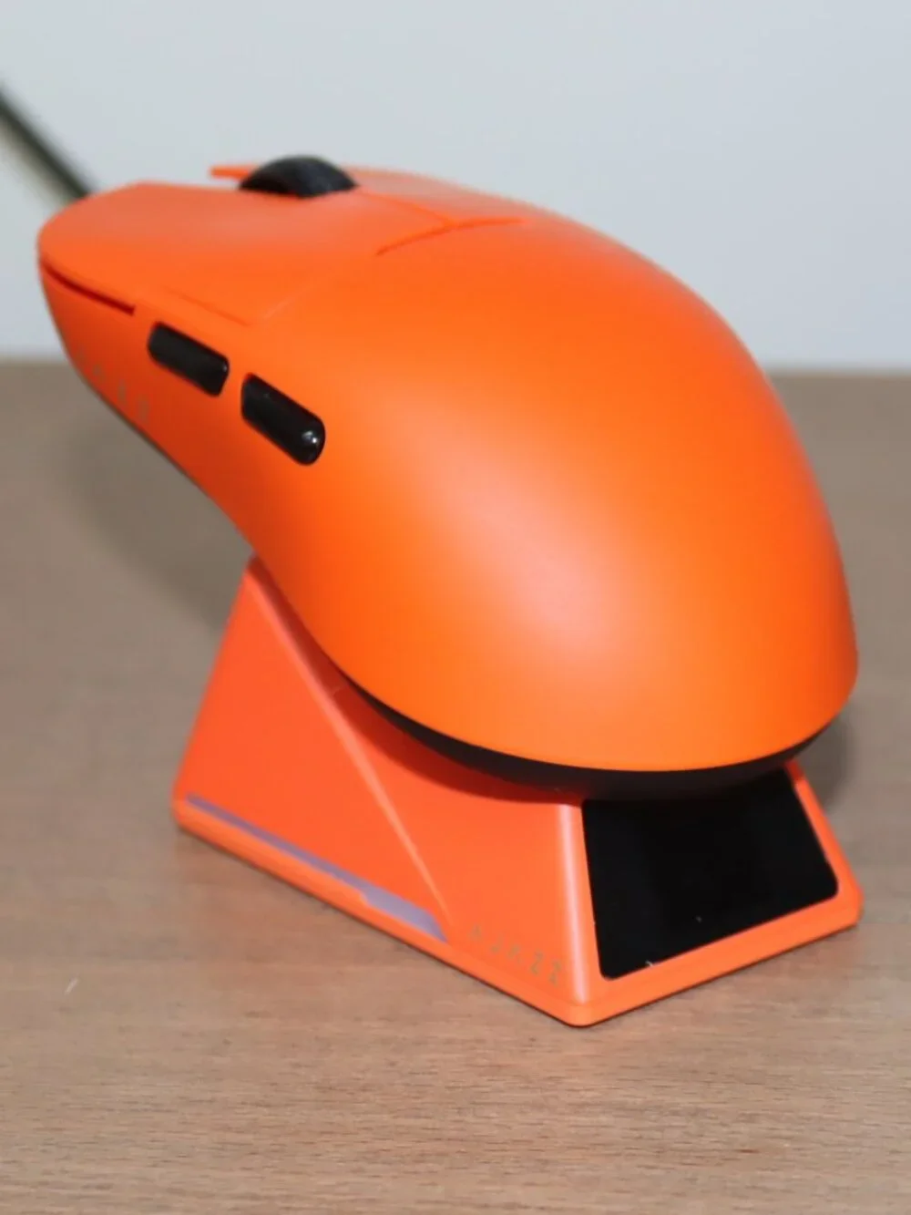 Orange Wireless Gaming Mouse with Magnetic Screen Charging Dock